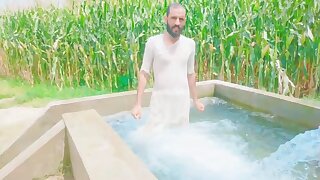 Pakistani villager in tubewell