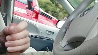 Guy jerking off on the road grabs a truck drivers attention. He pulls of to the side of the road and lets the trucker suck him off
