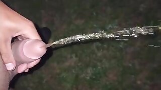 Twink pissing and cumming in the night