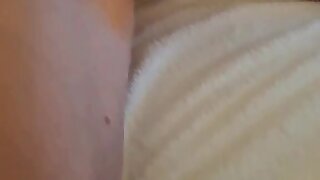 Muscle twink jerks on a hotel bed