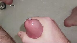 I sit on the side of the tub and cum some pee
